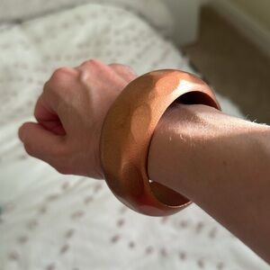 Wooden bronze bangle.
